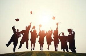 Picture of students throwing their grad caps