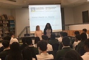 Picture of students listening to a presentation